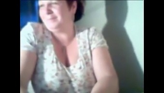 Older Lady Flaunts Her Breasts On Webcam